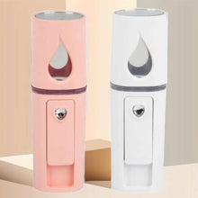 Load image into Gallery viewer, Pink and white portable nano mist sprayers for skin hydration and freshness.
