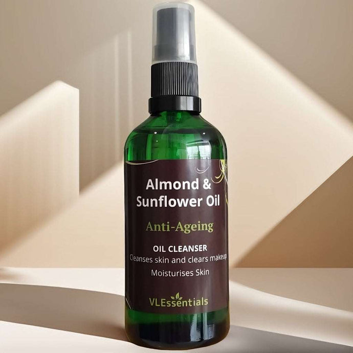 Anti-ageing almond and sunflower oil cleanser in green spray bottle for moisturizing and makeup removal